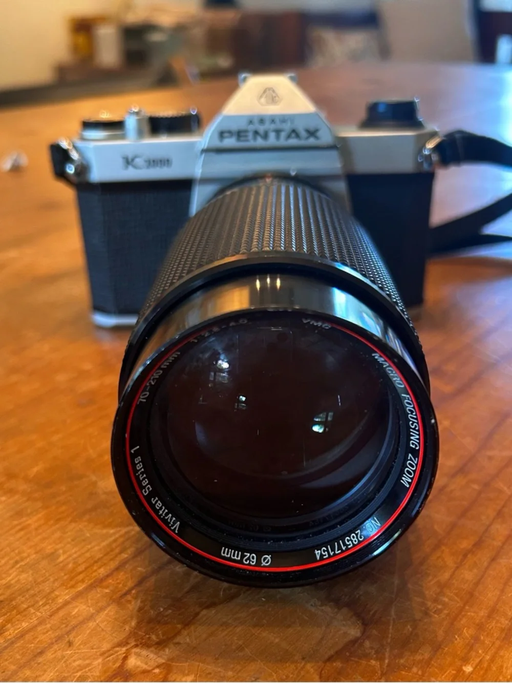 Asahi PENTAX K1000 SLR 35mm camera and Vivitar Series 1 macro-focusing zoom.
